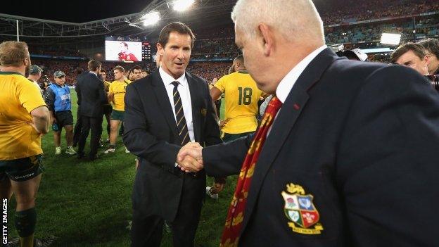 Robbie Deans congratulates Lions coach Warren Gatland