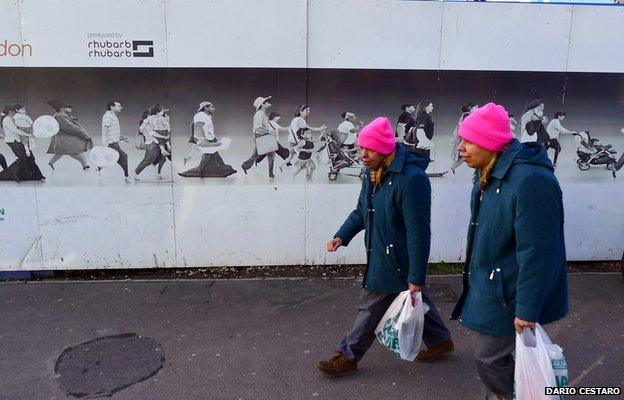 Two people in pink hats