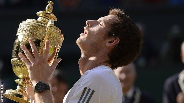 Andy Murray lifts the Wimbledon trophy