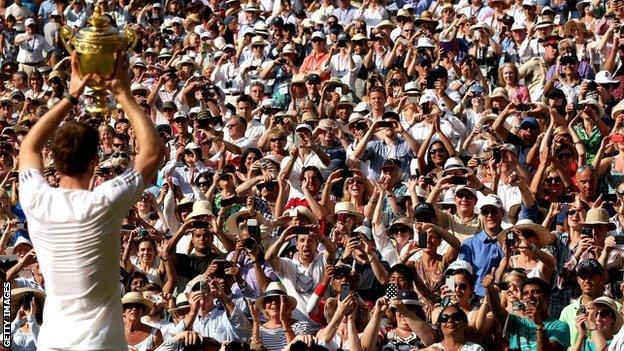 Andy Murray lifts the Wimbledon trophy