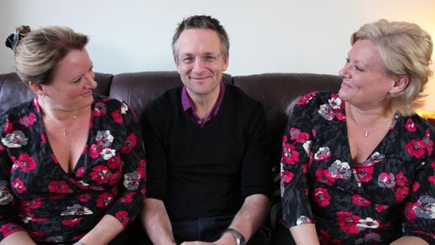 Michael Mosley sitting in the middle of twins Debbie and Trudi