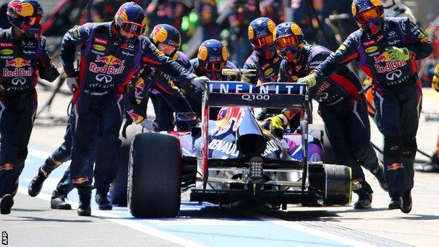 Mark Webber's Red Bull loses a wheel