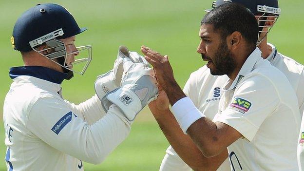 Tim Ambrose congratulates Jeetan Patel