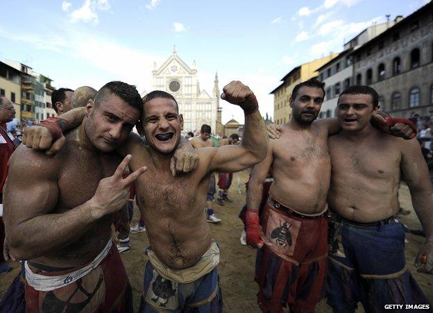 Bare-chested players in Santa Croce piazza