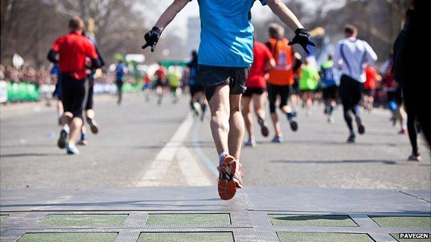 Marathon runners on Pavegen tiles