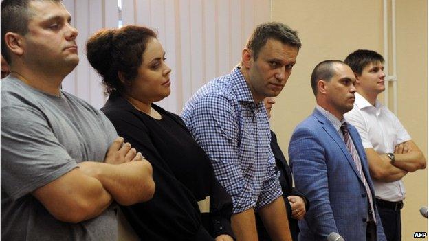 Alexei Navalny (3rd R) stands in a courtroom in Kirov on July 18, 2013