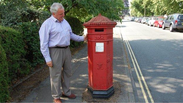 Penfold pillar box in College Lawn in Cheltenham