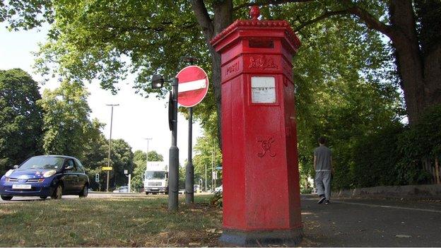 Penfold pillar box in Westall Green near corner of Queen's Road and Lansdown Road in Cheltenham