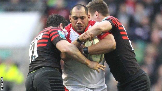 Saracens pair Brad Barritt and Owen Farrell tackle Ulster prop John Afoa