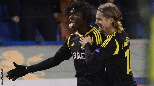 Mo Bangura (left) celebrates scoring for AIK