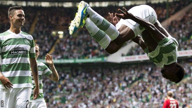 Efe Ambrose celebrates his goal with a summersault