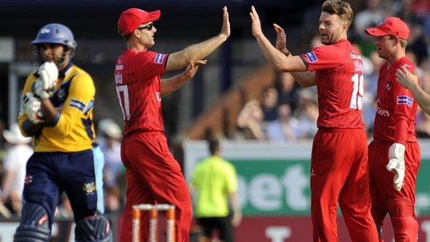 Aaron Lilley celebrates taking Adil Rashid's wicket at Old Trafford