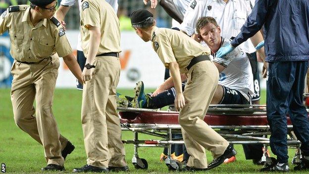 Spurs defender Jan Vertonghen is carried off in the Asia Trophy