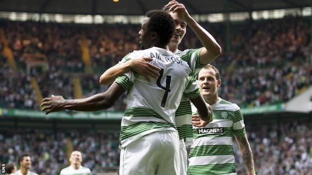 Efe Ambrose celebrates his goal against Cliftonville