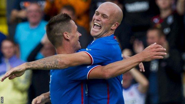 Ian Black celebrates with fellow Rangers scorer Nicky Black