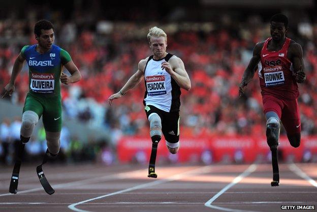 Jonnie Peacock competing in the T43/44 100 metres at the Anniversary Games on 28 July 2013