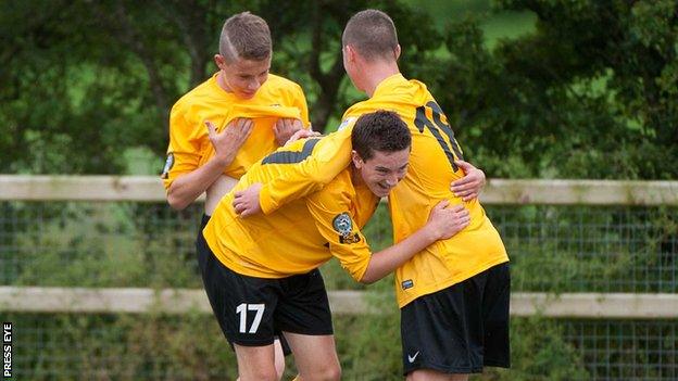 County Antrim celebrate after Ryan Caulfield's opening goal in their 4-0 Junior win over Ipswich on Wednesday