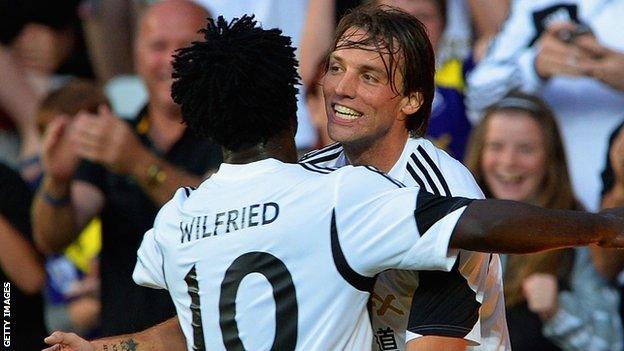 Swansea goal-scorers Wilfried Bony and Michu celebrate