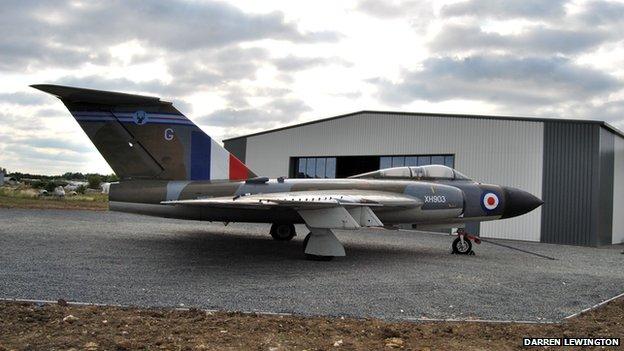 Aircraft outside new Jet Age Museum hangar