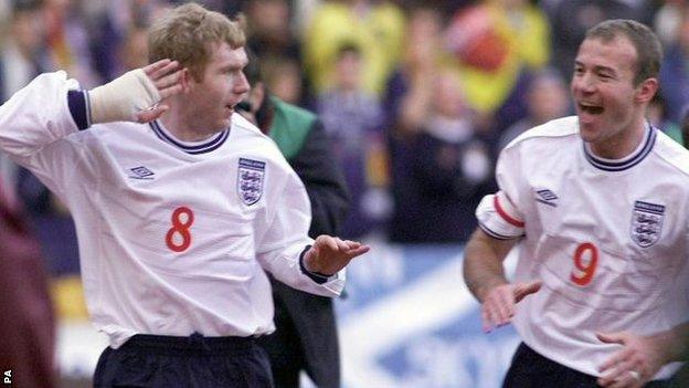 Paul Scholes celebrates with Alan Shearer after scoring at Hampden Park in the first leg of England's Euro 2000 play-off with Scotland