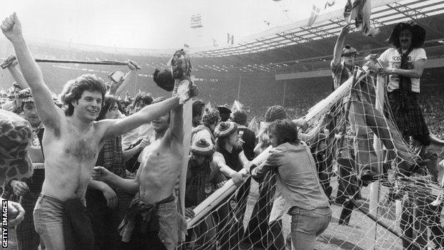 Scotland fans on the Wembley pitch in 1977