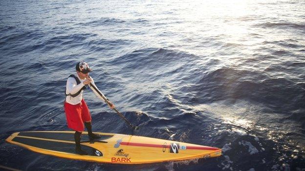 Benjamin Schiller Friberg paddles in the open sea of the Straits of Florida.