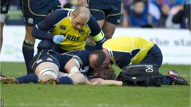 Scotland's Richie Gray receives treatment