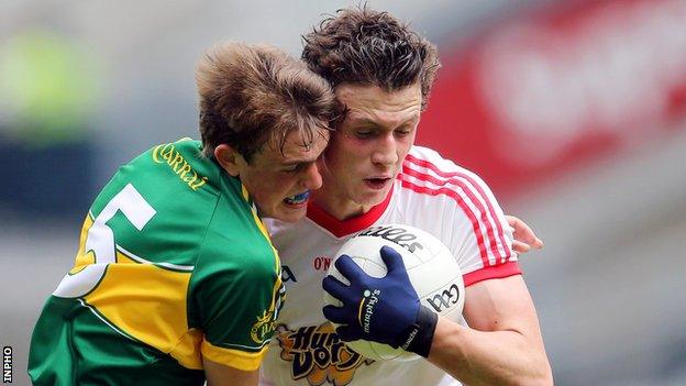 Kerry's Matthew Flaherty battles with Ronan Nugent