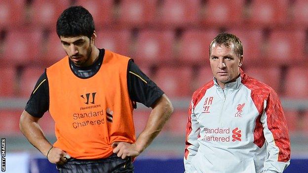 Luis Suarez (l) and Brendan Rodgers