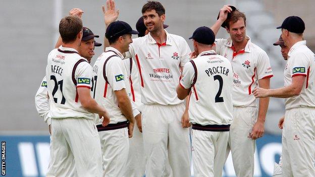 Kyle Hogg (centre) celebrates with Lancashire team-mates