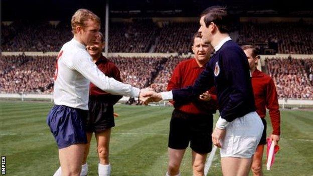 England captain Bobby Moore shakes hands with Scotland captain John Greig at Wembley in 1967