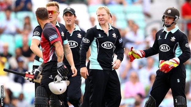 Surrey's Gareth Batty dismisses Somerset's Peter Trego