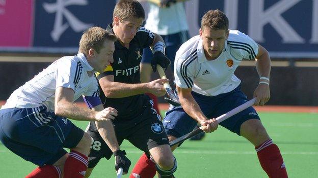 England men's hockey team in action