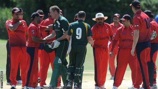 The Guernsey senior side shake hands after their game against Austria