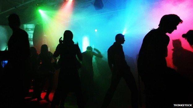 People dancing in a nightclub