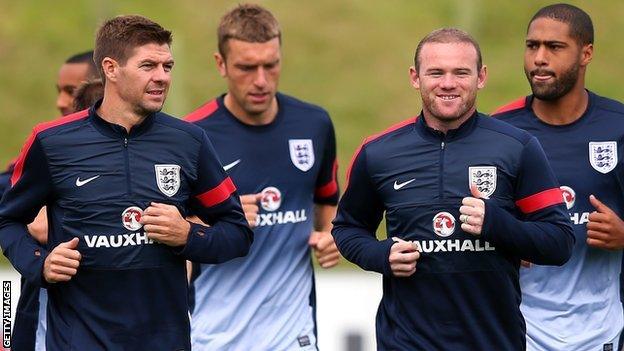 England duo Steven Gerrard (left) and Wayne Rooney (second right)