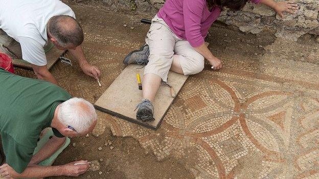 Excavation of a mosaic at Chedworth Roman Villa