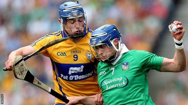 Clare's Colin Ryan challenges Limerick's Gavin O'Mahony