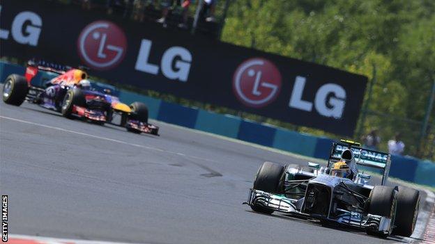 Sebastian Vettel and Lewis Hamilton (front)