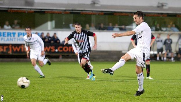 Liam Fox scores a penalty for Raith Rovers against Dunfermline