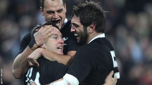 Israel Dagg (top) and Sam Whitelock (right) congratulate New Zealand try-scorer Ben Smith