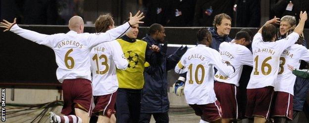 Arsenal celebrate their win at the San Siro in 2008