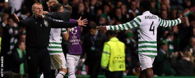 Neil Lennon celebrates after beating Barcelona