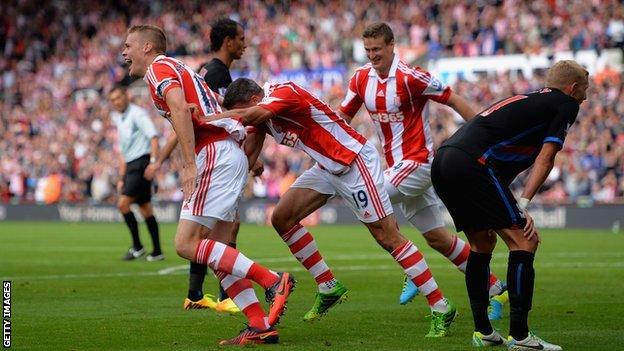 Ryan Shawcross (left) wheels away in celebration after his goal for Stoke against Crystal Palace