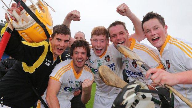 Antrim players celebrate their semi-final win