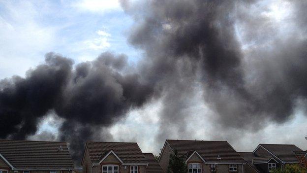 Black smoke rising from the fire in Valley Road