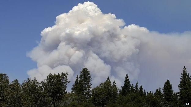 Smoke columns rise from the Rim Fire, near Yosemite National Park in California 26 August 2013