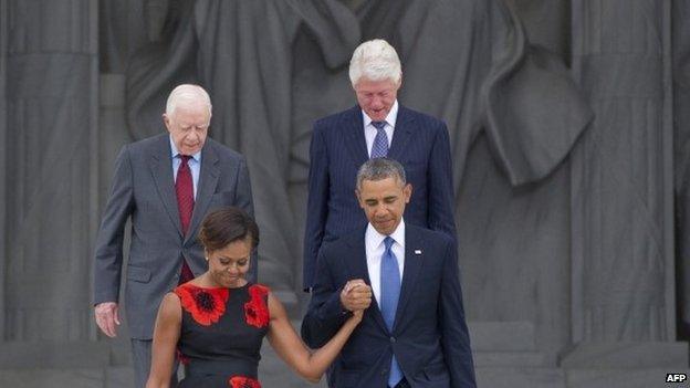 US President Barack Obama and First Lady Michelle Obama, along with former US President Bill Clinton and Jimmy Carter at the Lincoln Memorial in Washington DC on 28 August 2013