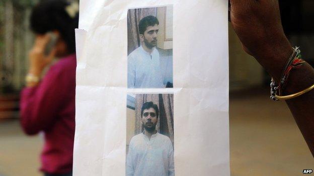 A poster with photos of Yasin Bhatkal