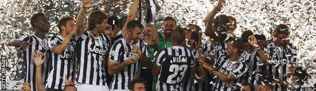 Juventus celebrate their Supercup win over Juventus.